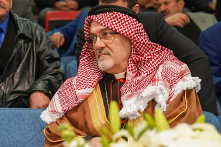 A photo published on the website of the Latin Patriarchate of Jerusalem and taken between 7 and 10 March 2024 shows the Carinian Pierbattista Pizzaballa, Latin Patriarch of Jerusalem, wearing a keffiyeh during a pastoral visit to the city of Fuheis. Rome, 29 March 2026. HANDOUT LATIN PATRIARCHATE OF JERUSALEM +++ ANSA PROVIDES ACCESS TO THIS HANDOUT PHOTO TO BE USED SOLELY TO ILLUSTRATE NEWS REPORTING OR COMMENTARY ON THE FACTS OR EVENTS DEPICTED IN THIS IMAGE - NO ARCHIVING - NO LICENSING - NPK +++