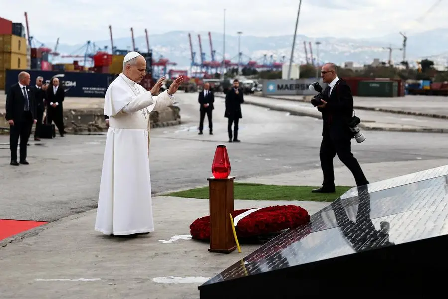 Pope Leo XIV holds a silent prayer at the site of the Beirut port blast in August 2020, during his first apostolic journey, in Beirut, Lebanon December 2, 2025. REUTERS/Yara Nardi , REUTERS