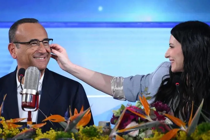 Laura Pausini e Carlo Conti durante la conferenza stampa prima della finale di Sanremo 2026 , ANSA