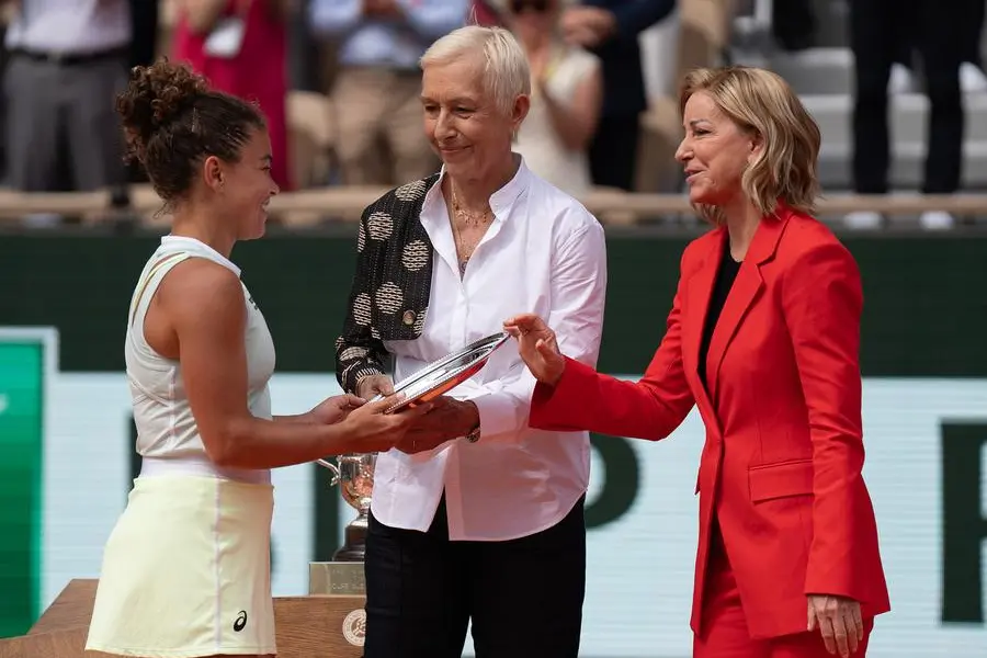 Jun8, 2024; Paris, France; Martina Navratilova and Chris Evert present Jasmine Paolini of Italy the finalist trophy on day 14 of Roland Garros at Stade Roland Garros. Mandatory Credit: Susan Mullane-USA TODAY Sports