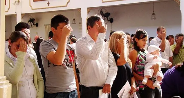 Il segno di croce al termine della messa