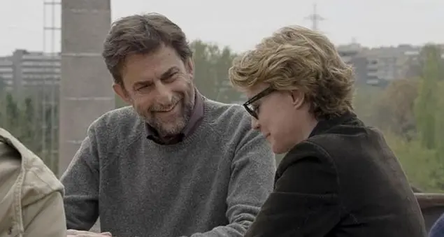 Due figli davanti a una vita che si spegne