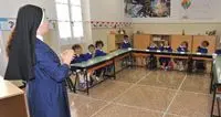 Le scuole cattoliche e gli “oneri per lo Stato”