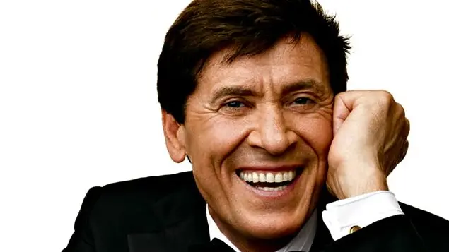 Il nonno ideale? Morandi e la Carrà