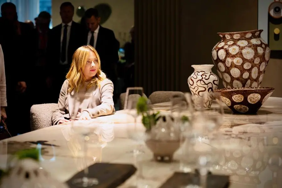 Italian Prime Minister Giorgia Meloni visits the Salone del Mobile on its inaugural day in Milan, Italy, 21 April 2026. Launched in Milan in 1961 as a vehicle for promoting Italian exports of furnishing and accessories, the Salone Internazionale del Mobile is the global benchmark event for the furnishing and design sector. ANSA/FILIPPO ATTILI-US PALAZZO CHIGI +++ UFFICIO STAMPA PALAZZO CHIGI +++ FOTO NON IN VENDITA - DA USARE SOLO PER FINI GIORNALISTICI +++ NPK +++