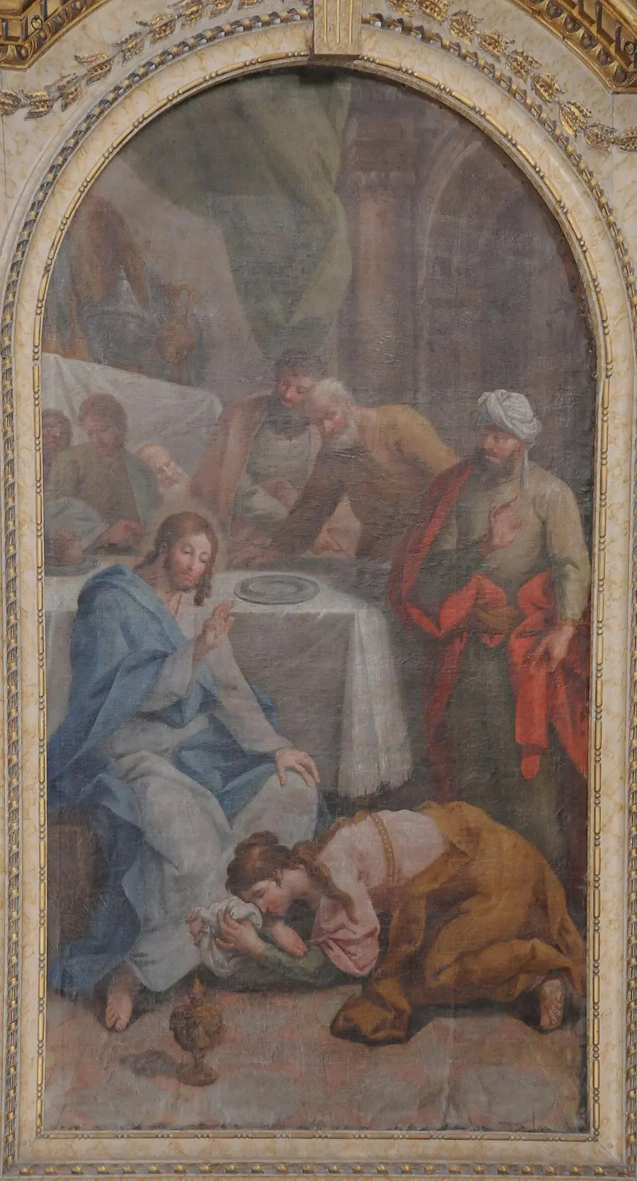 Mary Magdalene washes Jesus' feet
