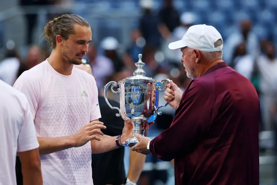 Tennis - U.S. Open - Flushing Meadows, New York, United States - September 13, 2026 Germany's Alexander Zverev celebrates with his father Alexander Zverev Sr. after winning the men's singles final against Ben Shelton of the U.S. REUTERS/Mike Segar