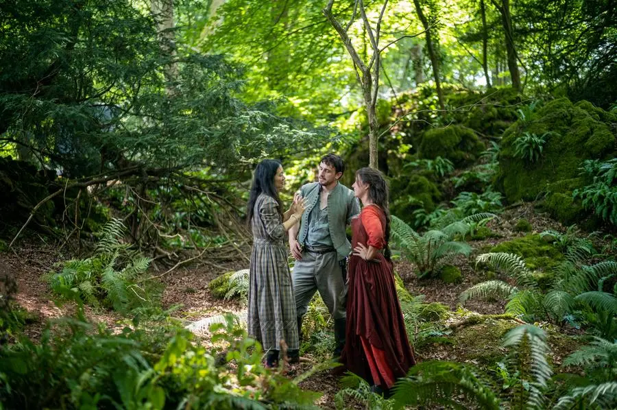 Director Chloé Zhao with Paul Mescal and Jessie Buckley (in the role of Shakespeare's wife) in \"Hamnet\".