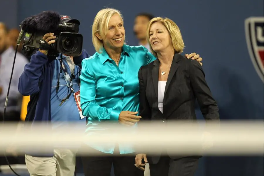 Tennis - US Open - Flushing Meadows, New York City, United States of America - 11/9/10 Martina Navratilova (L) embraces Chris Evert (R) as they walk out to toss the coin before the start of the women's final Mandatory Credit: Action Images / Jason O'Brien