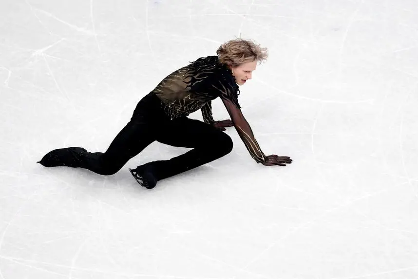 Milano Cortina 2026 Olympics - Figure Skating - Men Single Skating - Free Skating - Milano Ice Skating Arena, Milan, Italy - February 13, 2026. Ilia Malinin of United States falls during the Free Skating REUTERS/Claudia Greco