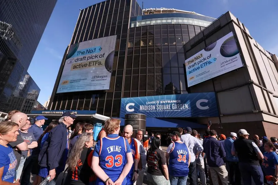 epa13025249 Ticket holders wait in line to enter Madison Square Garden for the NBA Finals Game 3, the San Antonio Spurs at New York Knicks, in New York, New York, USA, 08 June 2026. US President Donald Trump is expected to attend the game, increasing security measures. EPA/SARAH YENESEL