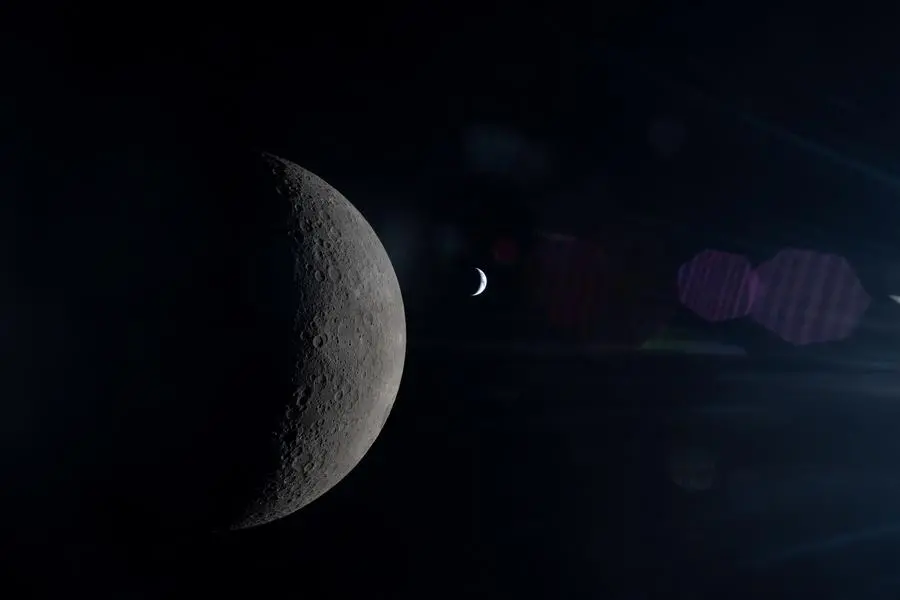 The Moon and Earth in a shot from the Artemis II mission.