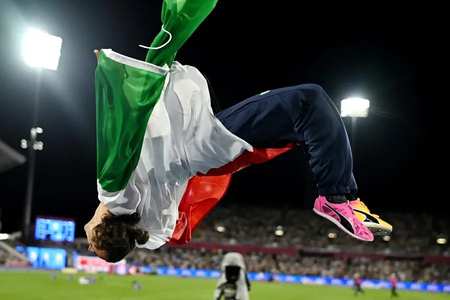 Athletics - European Athletics Championships - Alexander Stadium, Birmingham, Britain - August 14, 2026 Gold medallist Italy's Gianmarco Tamberi celebrates after winning the men's high jump final REUTERS/Dylan Martinez