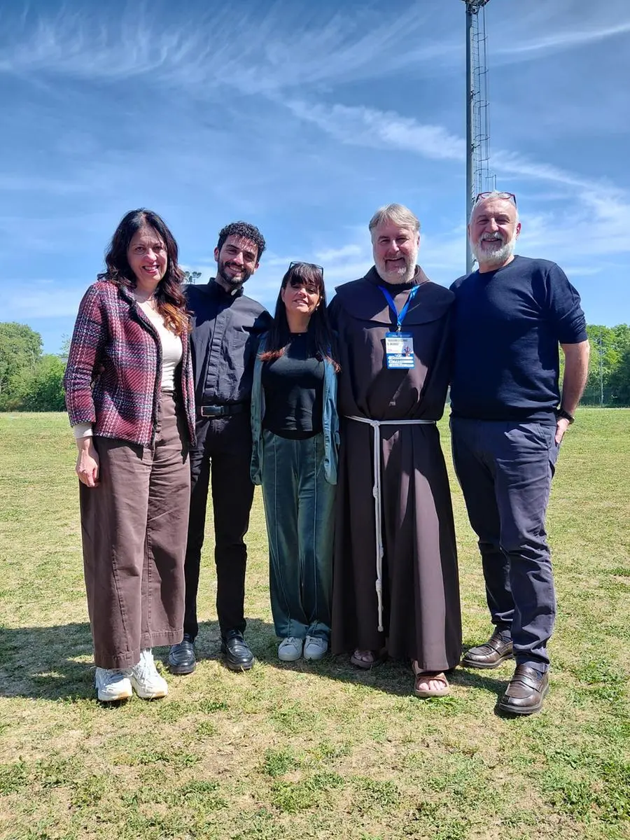 The national family pastoral office: from left, Barbara Rossi who with her husband Stefano Rossi (last on the right) leads the office alongside Father Marco Vianelli and Don Ignazio De Nichilo. Third from the left, Ombretta Pacchiarelli, in charge of events.