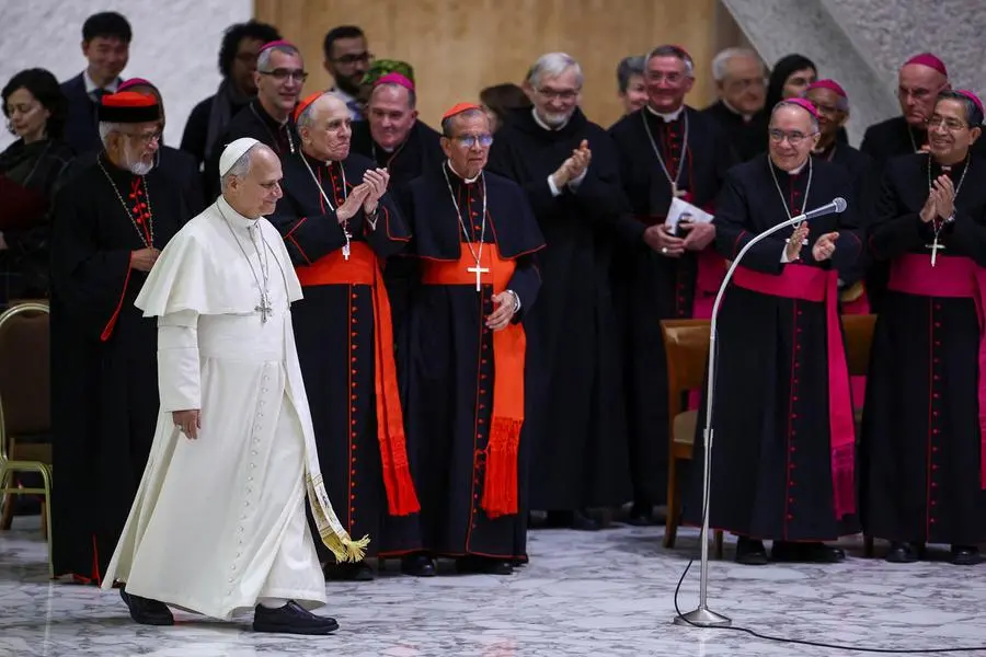 Pope Leo XIV walks on the day of the weekly general audience in the Paul VI Hall at the Vatican, January 7, 2026. REUTERS/Guglielmo Mangiapane , REUTERS