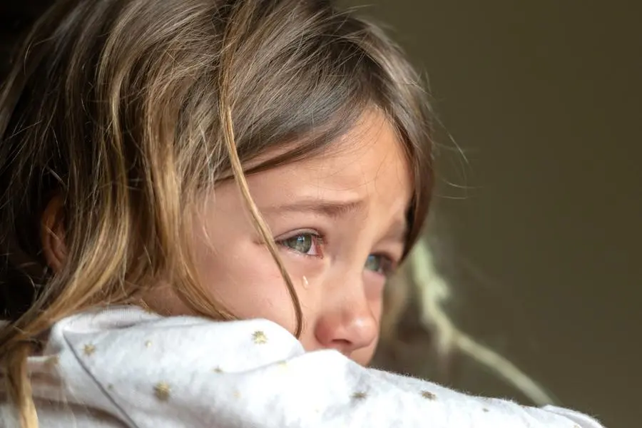 Sad crying caucasian little girl , Istock
