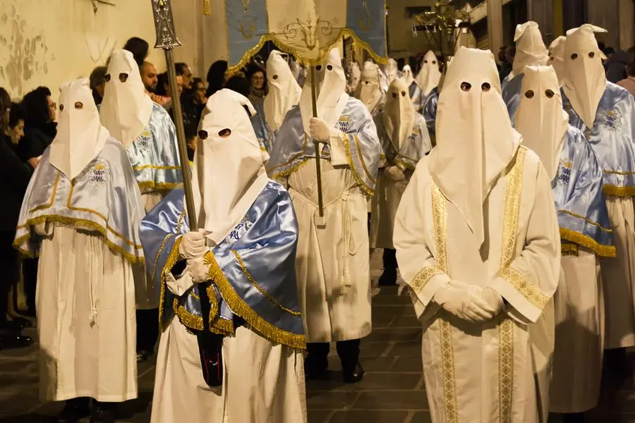 Incappucciati durante la tradizionale processione del Venerd\\u00EC Santo, Chieti. , iStock