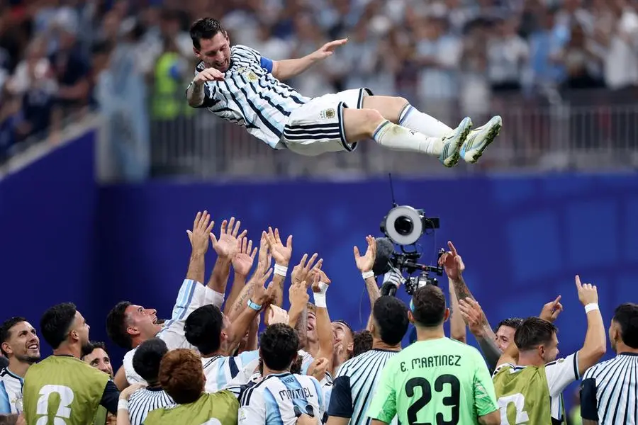 Soccer Football - FIFA World Cup 2026 - Round of 16 - Argentina v Egypt - Atlanta Stadium, Atlanta, Georgia, U.S. - July 7, 2026 Argentina's Lionel Messi is thrown in the air in celebration by teammates after the match as Argentina qualify for the quarter finals of the World Cup IMAGN IMAGES via Reuters/Brett Davis