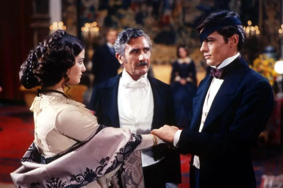 Claudia Cardinale, Paolo Stoppa e Alain Delon in una scena di Il Gattopardo