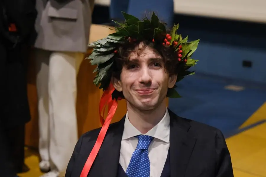 Mauro Glorioso, the student disabled by a bike thrown by five boys from the Murazzi del Po in Turin, graduated in medicine and surgery at the University of Turin, 6 November 2025. ANSA