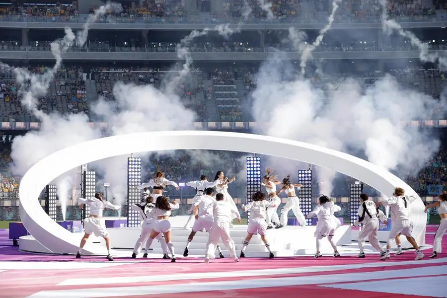 Audrey Nuna, lead singer of K-pop group Demon Hunters, performs at the opening ceremony of the Women's Asia Cup match between Australia and the Philippines in Perth, March 1, 2026.