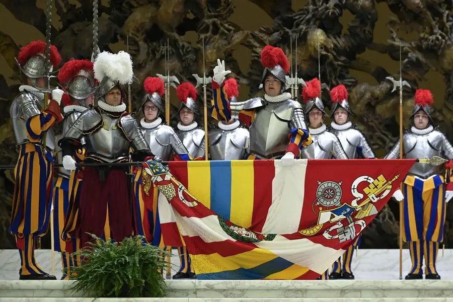 epa12936700 A handout picture provided by the Vatican Media shows new recruits of the Pontifical Swiss Guard during a swearing-in ceremony at the Paul VI audience hall in the Vatican, 06 May 2026. 28 new recruits of the Pontifical Swiss Guard will take their oath of loyalty to Pope Leo XIV. EPA/VATICAN MEDIA HANDOUT HANDOUT EDITORIAL USE ONLY/NO SALES