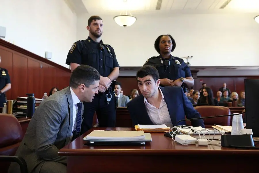 Luigi Mangione appears in Manhattan Supreme Court for a hearing in the murder case of UnitedHealthcare CEO Brian Thompson in New York City, U.S., December 9, 2025. William Farrington/Pool via REUTERS , via REUTERS