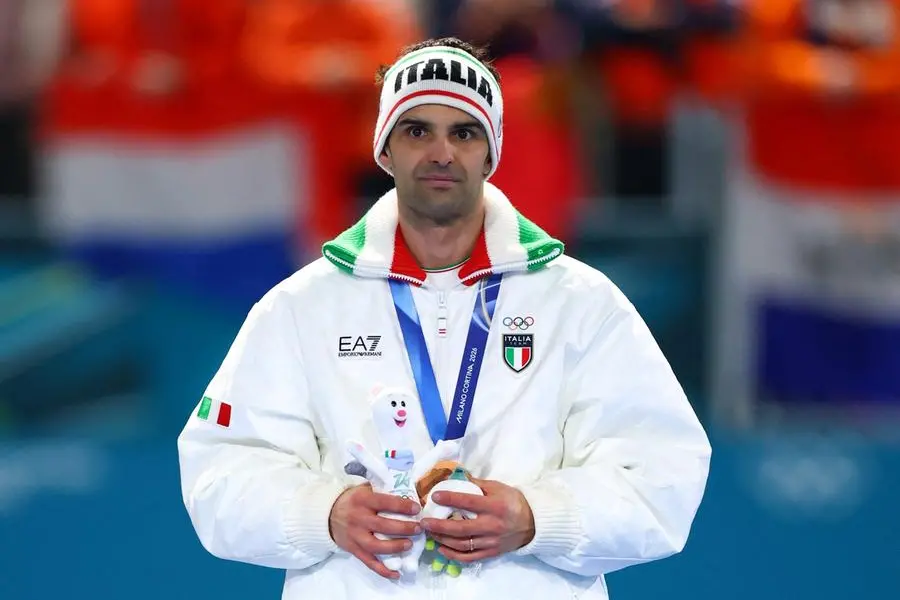 Milano Cortina 2026 Andrea Giovannini bronzo nella mass start, velocit\\u00E0 sul ghiaccio. , REUTERS