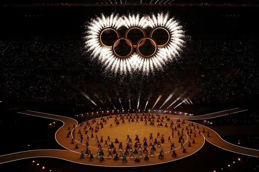 Un momento della cerimonia di apertura delle Olimpiadi invernali di Milano Cortina allo stadio di San Siro , REUTERS