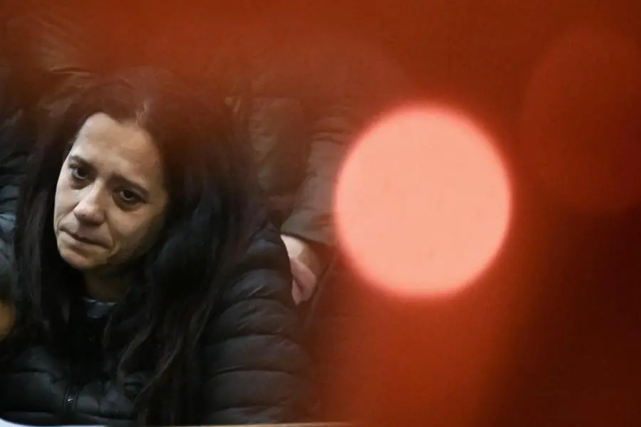 Patrizia Mercolino, madre del bimbo di due anni a cui \\u00E8 stato trapiantato un cuore danneggiato a Napoli, durante la fiaccolata per il figlio a Nola gioved\\u00EC sera , ANSA