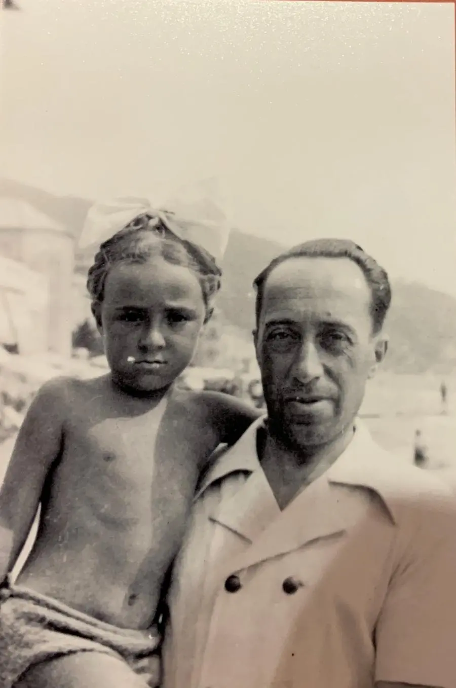 Elena Colombo in her father's arms in Liguria in 1940