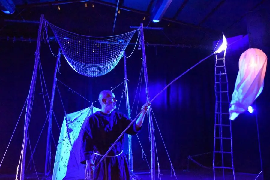 The Capuchin religious on stage during a performance of the evangelical song of the miraculous catch.