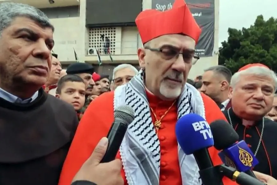 A frame taken from an AFP video from December 24, 2023 shows the Latin Patriarch of Jerusalem, Cardinal Pierbattista Pizzaballa, during an interview while wearing a Palestinian keffiyeh. Rome, 29 March 2026. FRAME VIDEO AFP +++ ATTENTION: ANSA DOES NOT OWN THE RIGHTS TO THIS PHOTO WHICH CANNOT BE PUBLISHED WITHOUT THE AUTHORIZATION OF THE SOURCE OF ORIGIN TO WHICH IT IS REFERRED +++ NPK +++