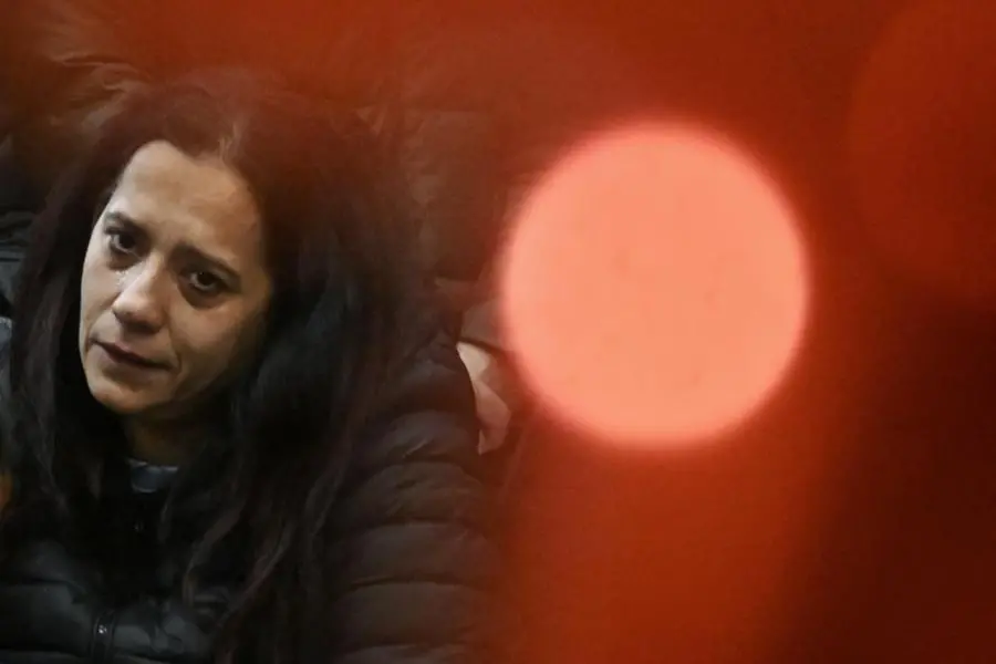 Patrizia Mercolino, mother of the two-year-old child who received a damaged heart transplant in Naples, during the torchlight procession for her son in Nola, 19 February 2026. ANSA/CIRO FUSCO