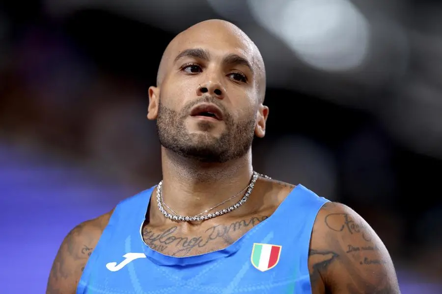Marcell Jacobs con la divisa italiana , EPA
