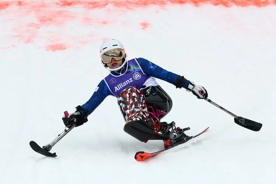 Milano Cortina 2026 Paralympics - Para Alpine Skiing - Women's Slalom Sitting - Tofane Alpine Skiing Centre, Belluno, Italy - March 14, 2026. Momoka Muraoka of Japan in action during the second run in the Women's Slalom Sitting. REUTERS/Lisi Niesner