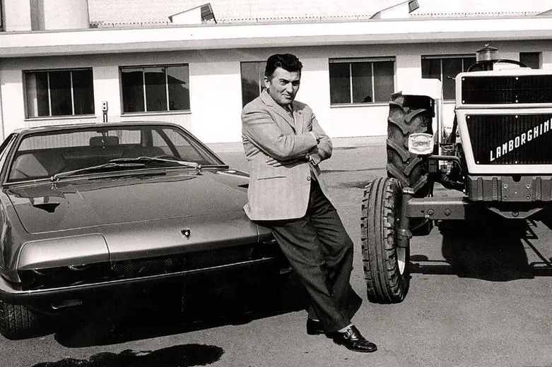 Ferruccio Lamborghini nel 1964 con una vettura fuoriserie ed un mezzo agricolo nello stabilimento Lamborghini di Sant\\'Agata Bolognese , ANSA