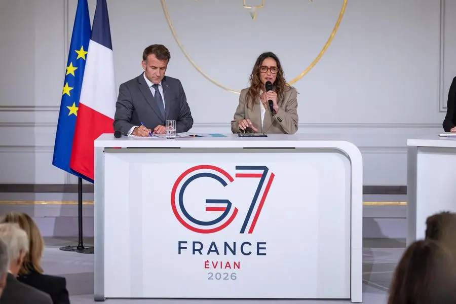 Il presidente francese Emmanuel Macron con Bathylle Missika, responsabile del Segretariato 4P, durante l\\u2019incontro all\\u2019Eliseo con i rappresentanti dei gruppi impegnati sui temi sociali ed economici in vista del G7 di \\u00C9vian-les-Bains , EPA