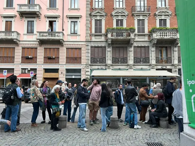 The long wait in line at the entrance to the Dal Verme theater in Milan.