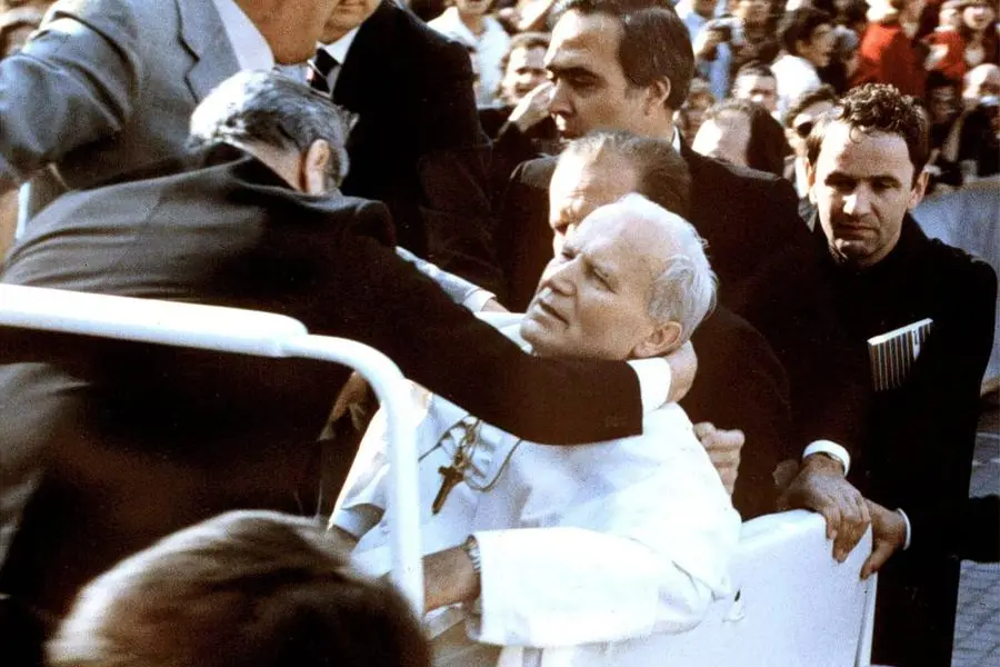 An archive image shows Pope John Paul II, wounded in St. Peter's Square, supported by collaborators, a few moments after the attack on May 13, 1981. ANSA