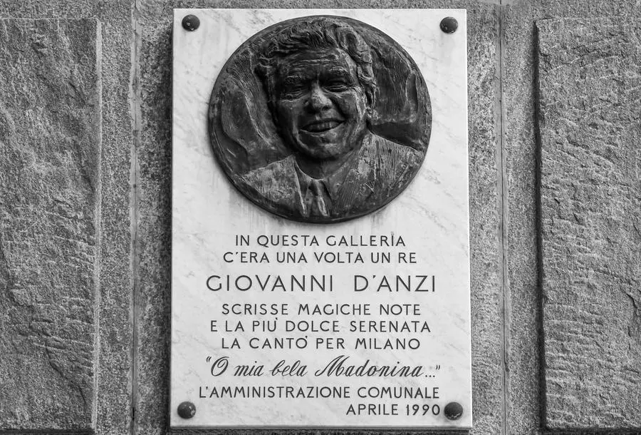 Giovanni D'Anzi (1906-1974) was an Italian songwriter and author of the song \"O my beautiful Madonna\" (\"My beautiful little Madonna\"), dedicated to Milan, his hometown, which soon became very popular and a sort of unofficial city anthem. In 1990 to his memory a plaque was hung in Galleria del Corso in Milan, in front of the place where he worked and near where he lived, the plaque reads: \"Once upon a time in this gallery there was a king: Giovanni D'anzi, he wrote magic notes, and the sweetest serenade he sang for Milan: O my beautiful Madonina \".