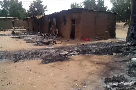 epa04046540 A photograph made available on 29 January 2014 and dated 28 January 2013 shows the remains of a houses after a Boko Haram attack, killing 70 people, in Kawuri, Nigeria. Reports state that 200 house where also destroyed during the attacks. The Islamist group, Boko Haram, whose name means 'Western education is forbidden,' is active in north-eastern Nigeria. EPA/STR