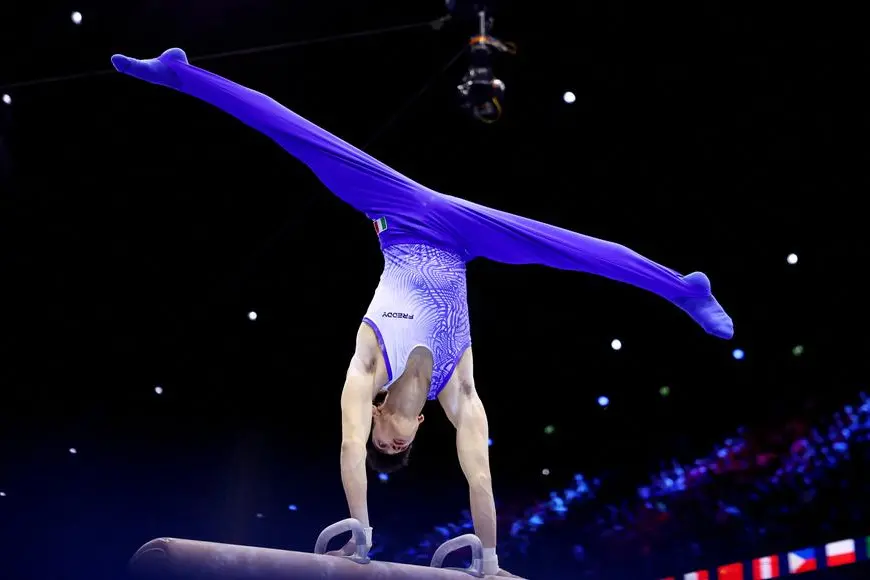 Artistic Gymnastics - 2026 World Artistic Gymnastics Championships - Rotterdam Ahoy, Rotterdam, Netherlands - October 24, 2026 Italy's Gabriele Targhetta in action during the men's pommel horse final REUTERS/Piroschka Van De Wouw