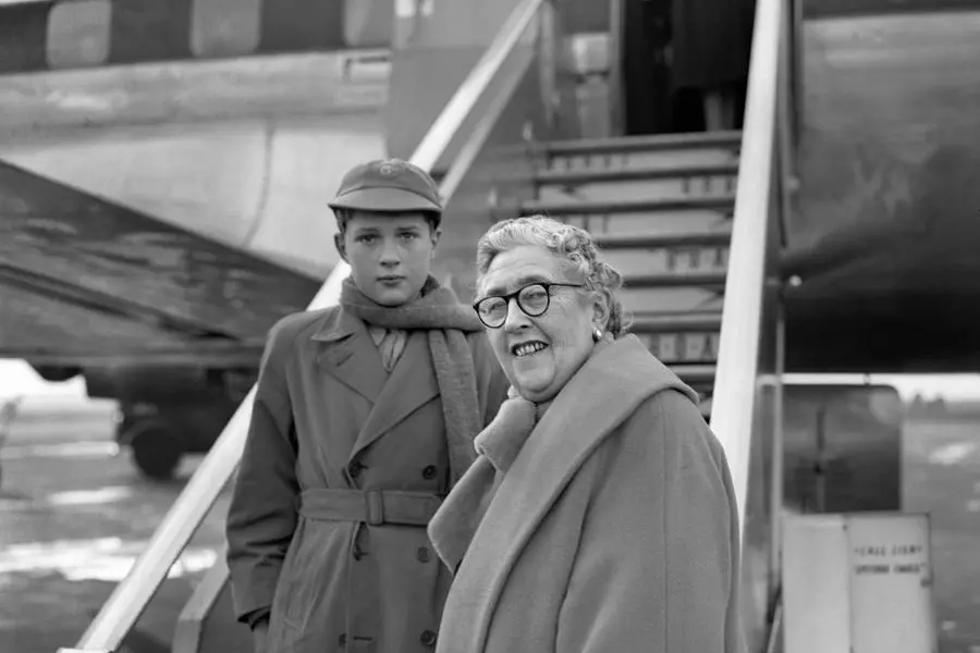The writer Agatha Christie with her nephew Matthew Prichard (now 82 years old), father of James, returning from a trip to London airport.