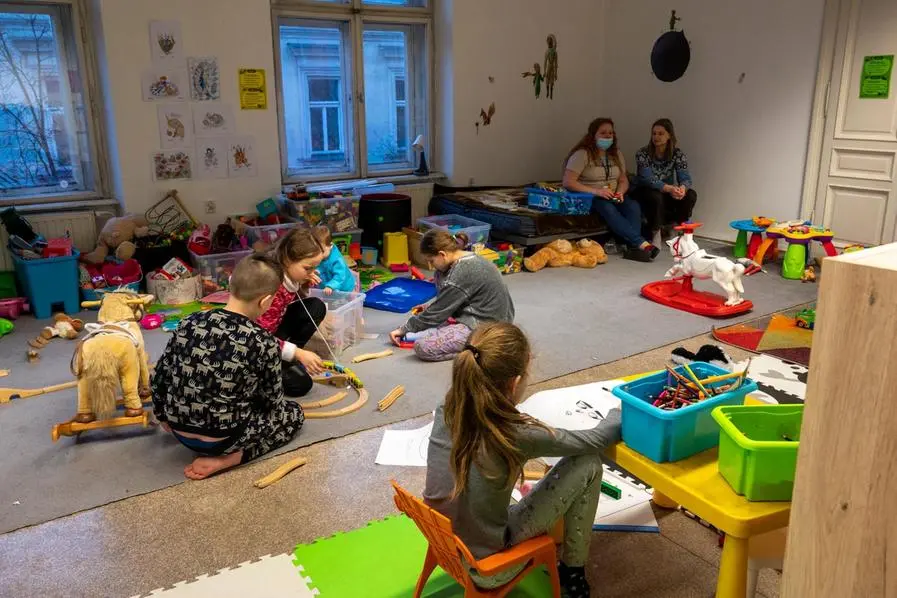 Boys and girls in one of the child friendly spaces of Terre des hommes.