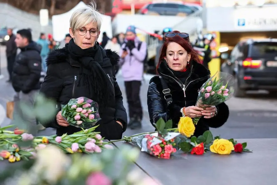 Some people leave flowers outside the 