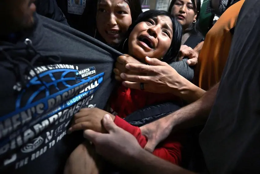 Carol Guzy-ZUMA Press-iWitness-for Miami Herald.