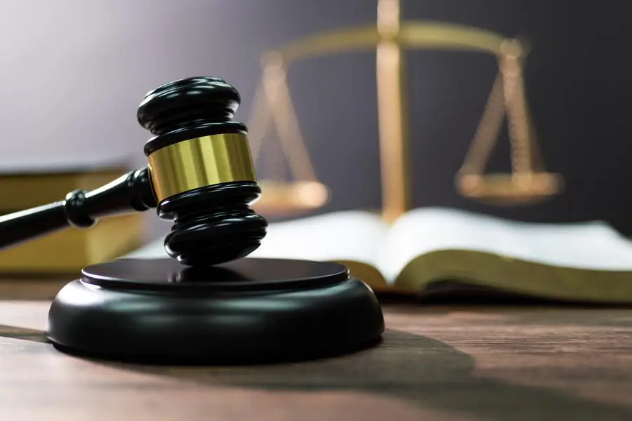 Gavel and scales of justice on the table. , Getty Images