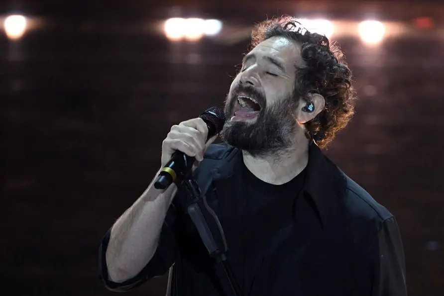Italian singer Tommaso Paradiso performs on stage at the Ariston theatre during the 76th edition of the Sanremo Italian Song Festival, in Sanremo, Italy, 25 February 2026. The music festival will run from 24 to 28 February 2026. ANSA/RICCARDO ANTIMIANI
