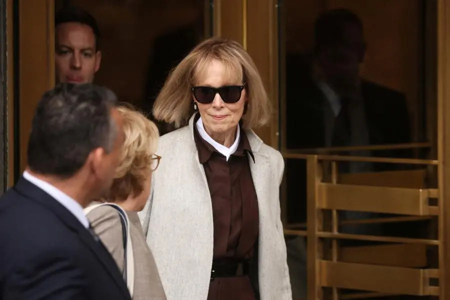 E. Jean Carroll, Former U.S. President Donald Trump rape accuser, departs following the start of a civil case at Manhattan federal court in New York City, U.S., April 25, 2023. REUTERS/Brendan McDermid
